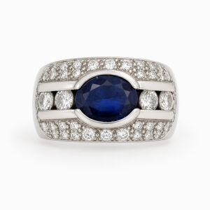 Anillo de Oro Blanco con Zafiro Central y Diamantes