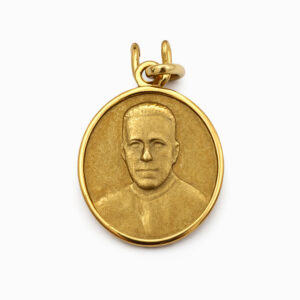 Medalla religiosa en oro con relieve retrato santo