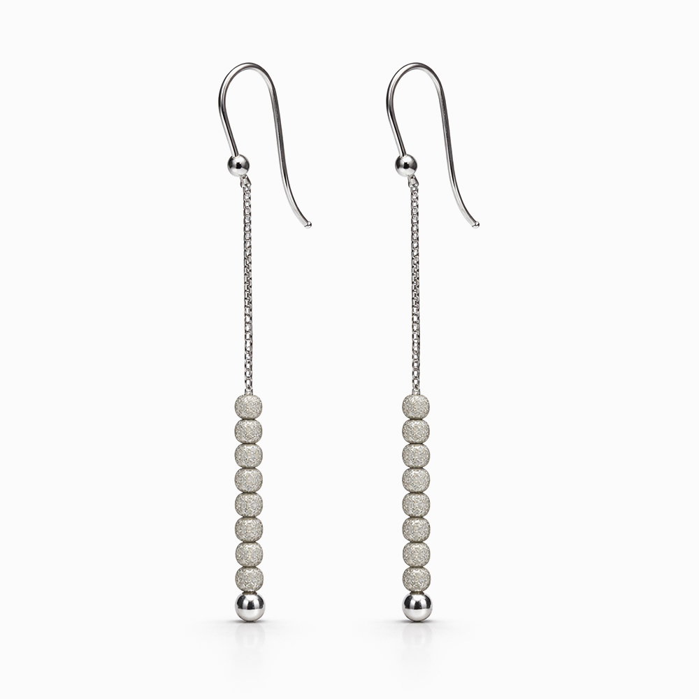 Aros colgantes de oro blanco con esferas texturadas